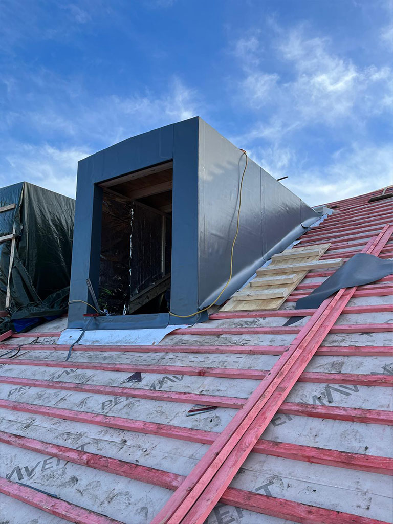 Home_Page_Picture_Portrait_Glassworks_Build_Rooftop_Window